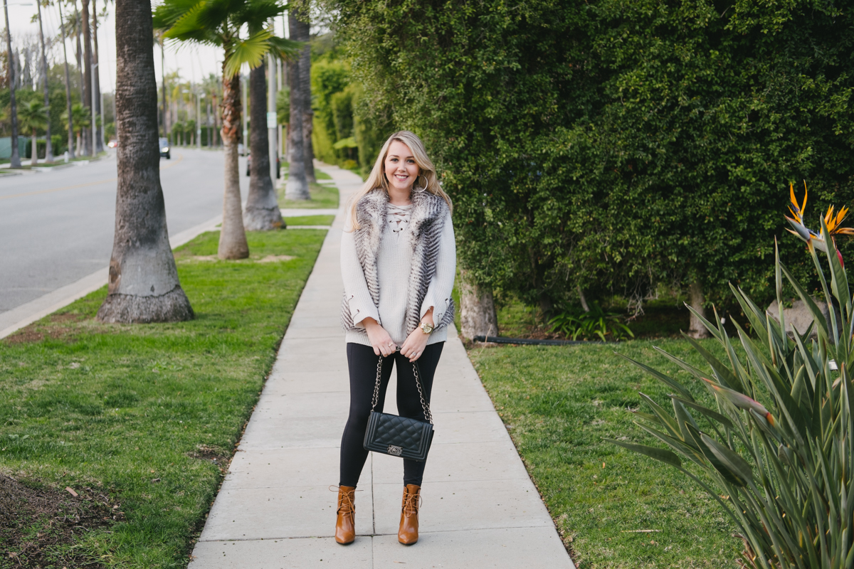 Debora Dahl off-white sweater and fur vest in Beverly Hills