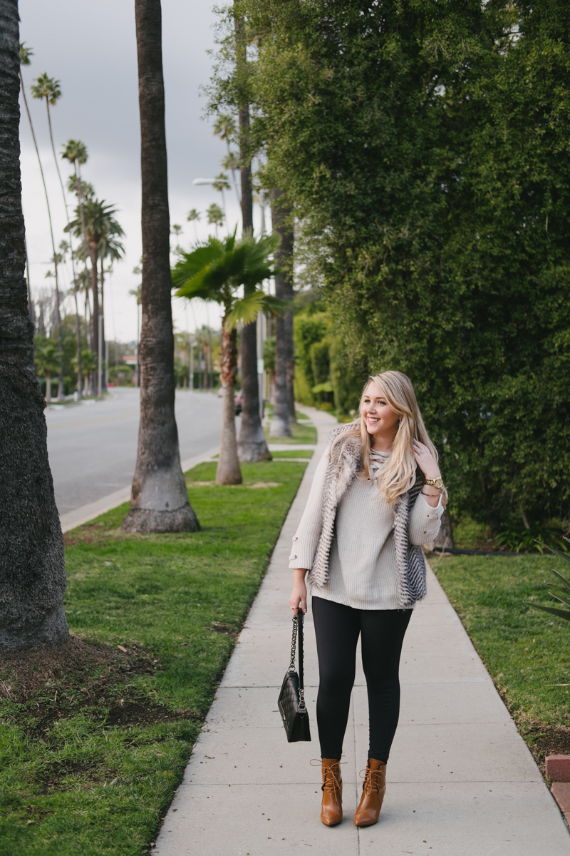 Debora Dahl off-white sweater and fur vest in Beverly Hills