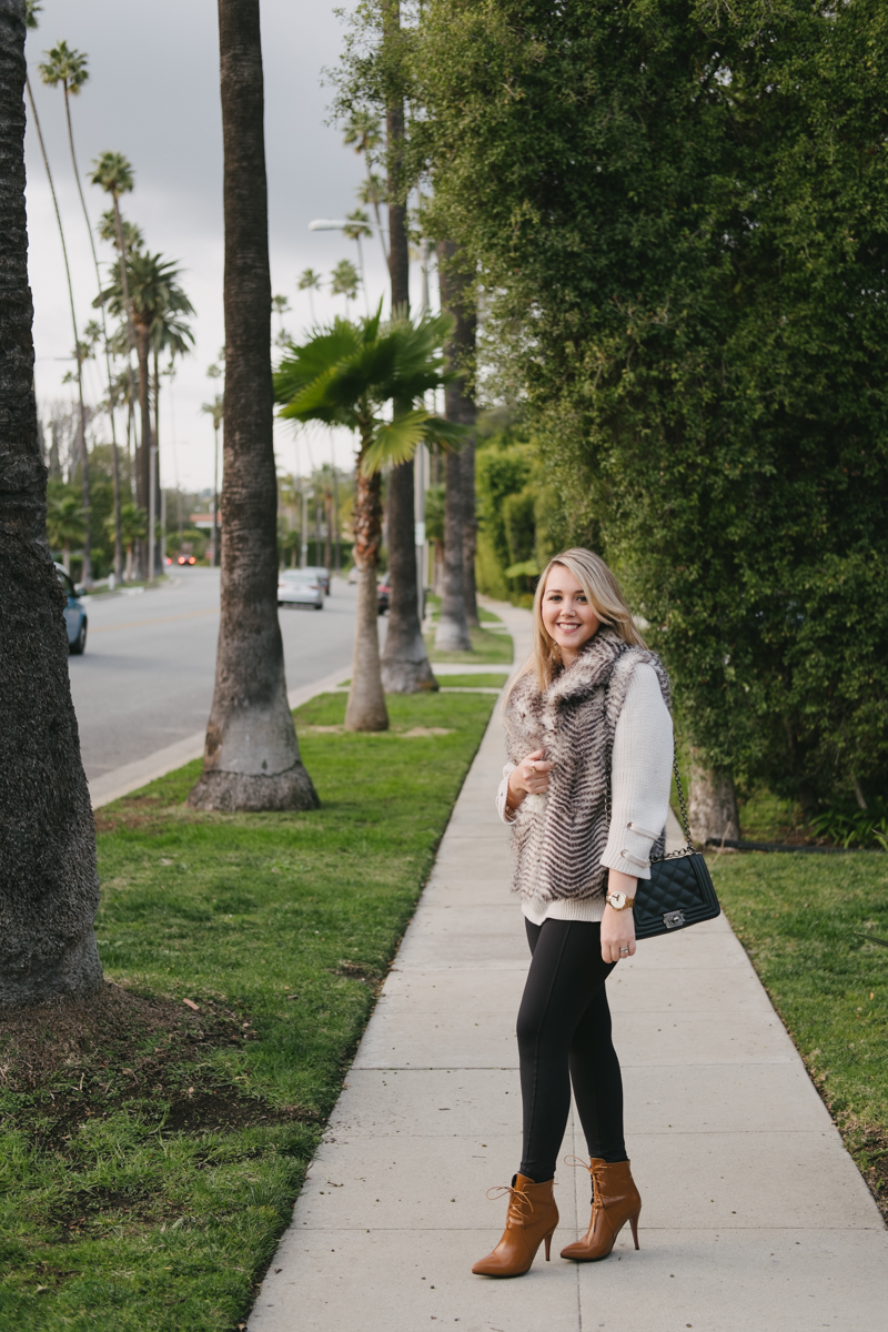 Debora Dahl off-white sweater and fur vest in Beverly Hills