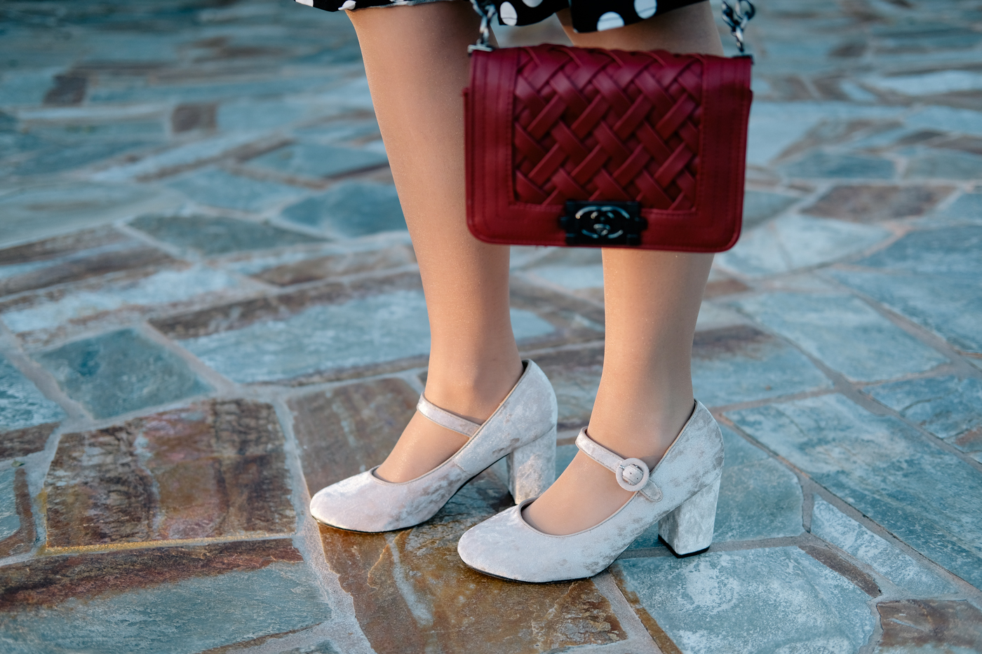 Velvet shoes and red purse